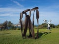 `Cover Shot` is a sculptural artwork by James Rogers at the Sculpture by the Sea annual events free to the public at Bondi.